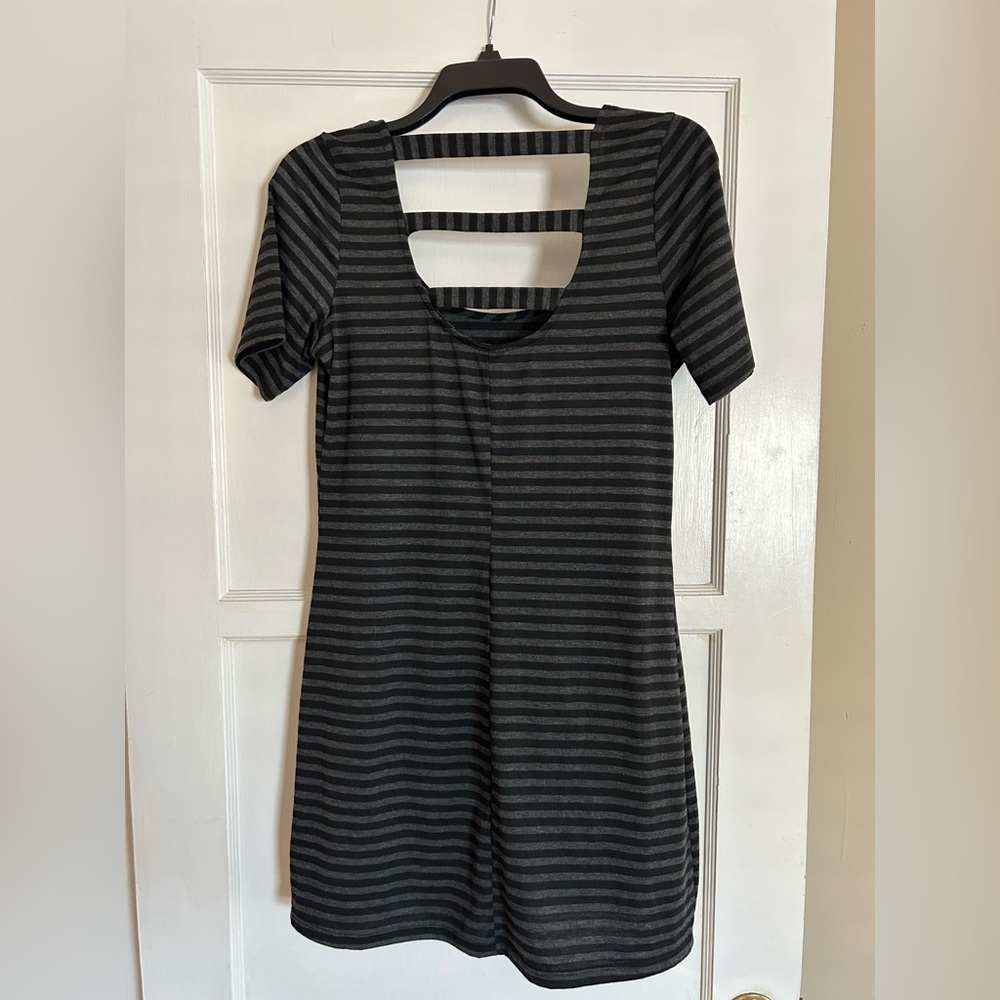 h.i.p. Happening in the present.  Made in USA .  Large